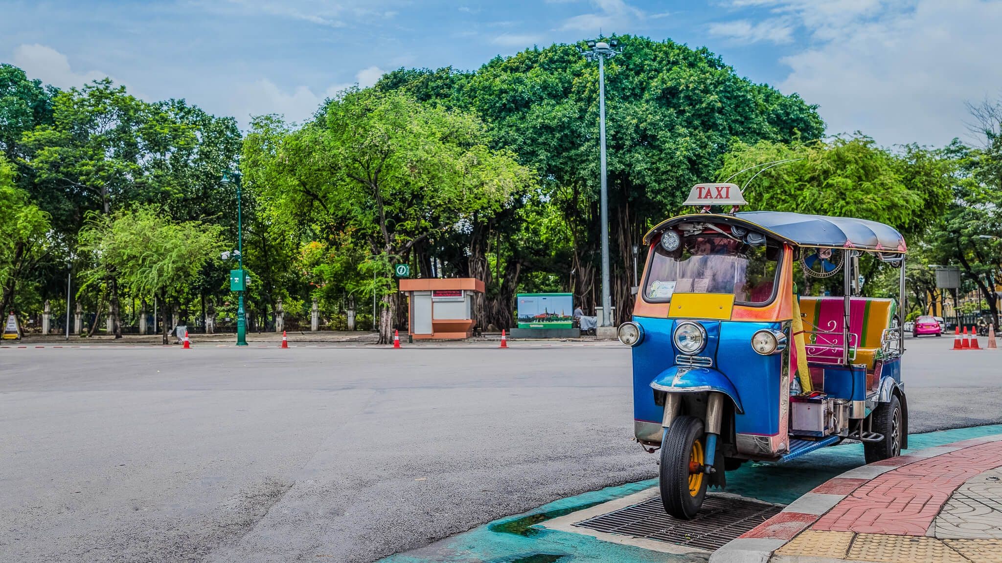Thai street with a tuk-tuk